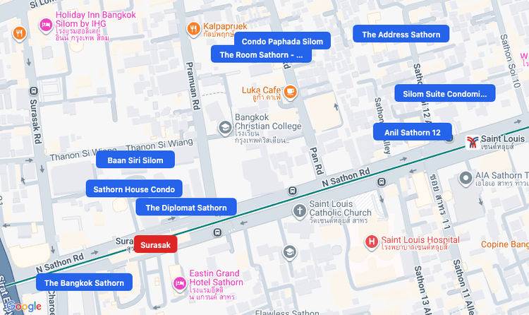 Screenshot of Surasak (BTS Silom (Green)) area showing nearby condos and landmarks in Bangkok
