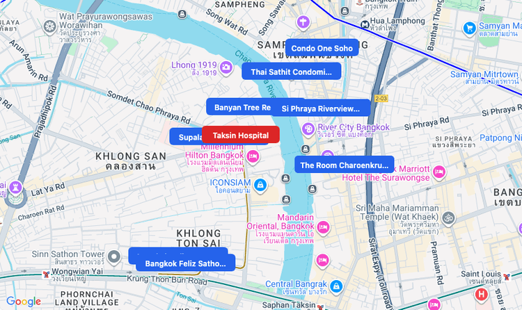Screenshot of Taksin Hospital (hospital) area showing nearby condos and landmarks in Bangkok